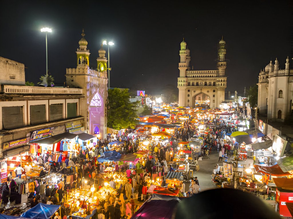 Charminar in rainy season with nearby Chowmahalla Palace, Mecca Masjid & vibrant streets